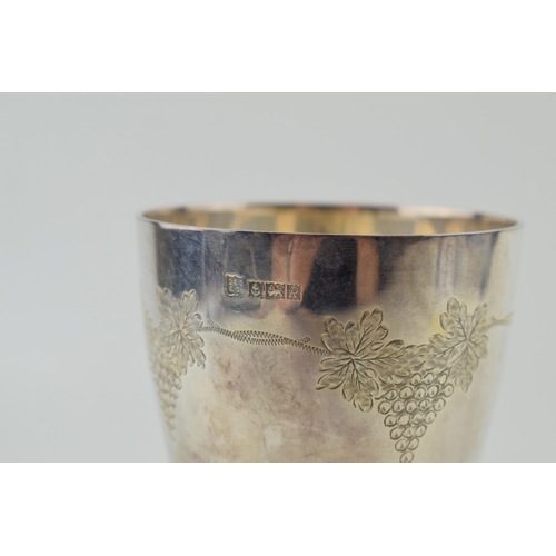 575 - Hallmarked silver goblet, vine and grape engraved decoration, Birmingham 1966, 13.5cm tall, 208.3g.