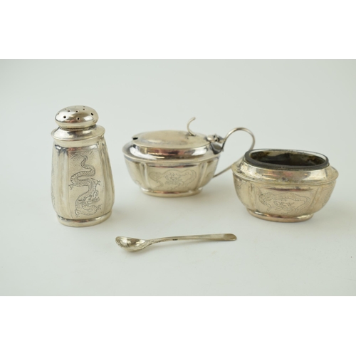 581 - Silver three piece cruet set, with glass liners, engraved, stamped 'silver 90', with associated plat... 