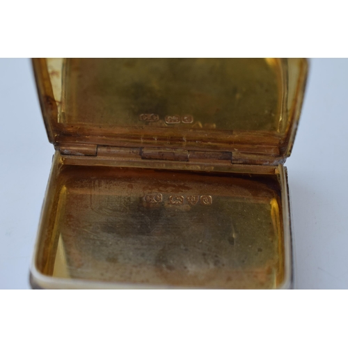 582 - Hallmarked silver snuff box with engineered decoration, vacant cartouche, 37.2g, gilt wash interior,... 