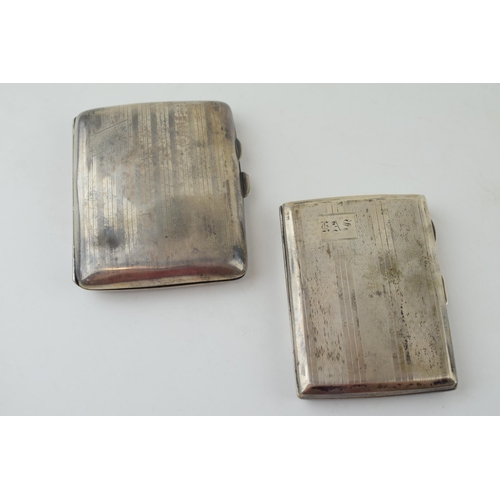 583 - A pair of silver cigarette cases, with striped decoration, 122.4g (2 - with dents).