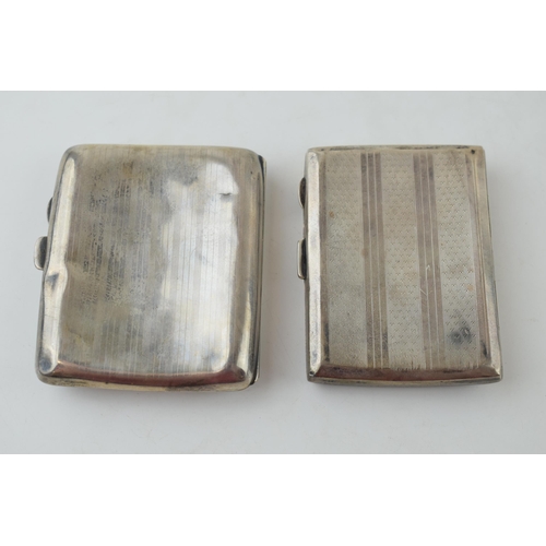 583 - A pair of silver cigarette cases, with striped decoration, 122.4g (2 - with dents).