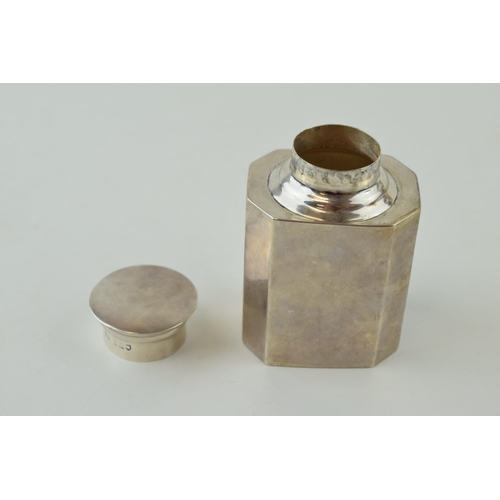 592 - Silver octagonal tea caddy with silver removable lid, 9.5cm tall, London 1906, 88.1g.