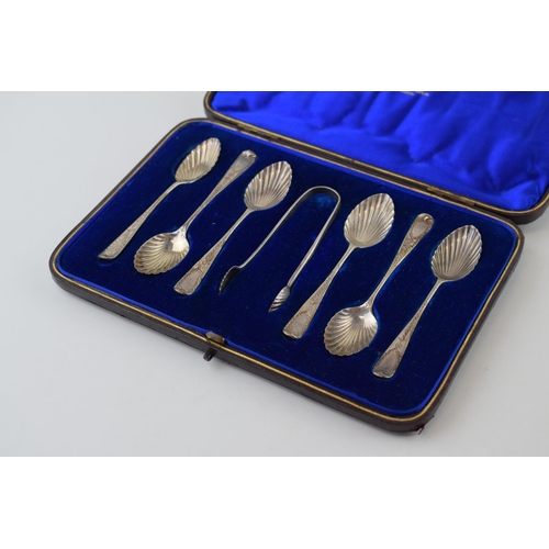 593 - Silver set of six tea spoons with matching tongs, bright cut decoration, in fitted case, London 1890... 