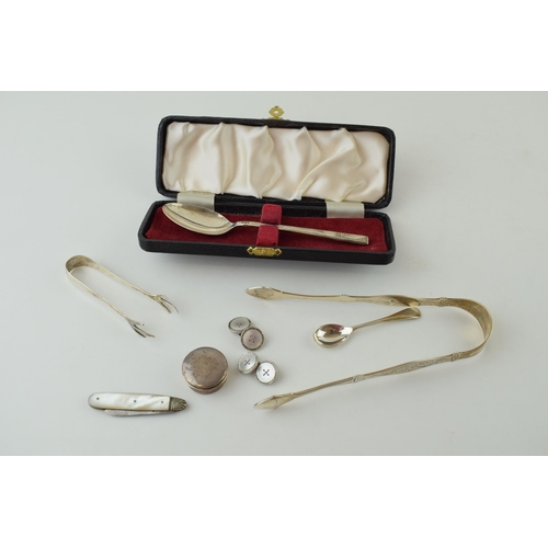 594 - Silver to include a pair of silver and mother of pearl cufflinks, a condiment spoon, a Georgian pair... 