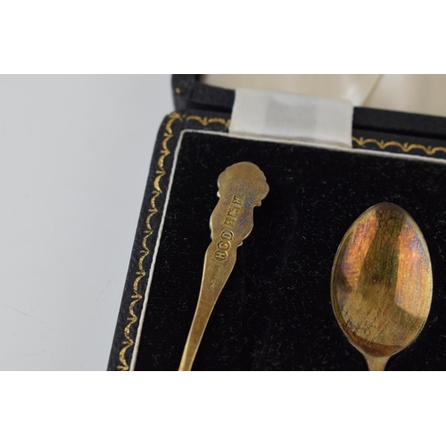 597 - Two cased sets of six silver tea spoons, one gilt set, Birmingham 1957, Henry Clifford Davis, with a... 