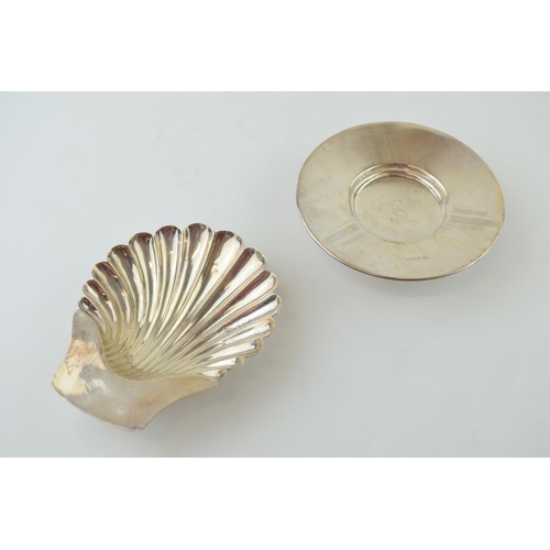 598 - A silver Walker and Hall Art Deco small pedestal dish, engraved, Sheffield 1955, with a silver shell... 