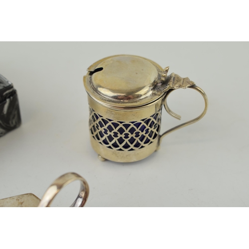 603 - Silver to include an oil candlestick, Birmingham 1942, with a case with engineered decoration, a mar... 