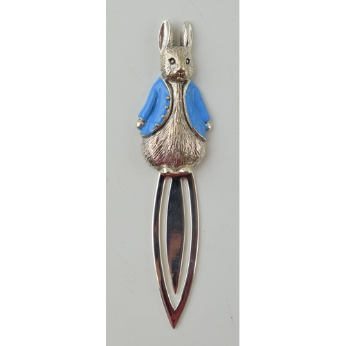 605 - Silver bookmark with Peter Rabbit with blue enamel coat, 7.5cm long.