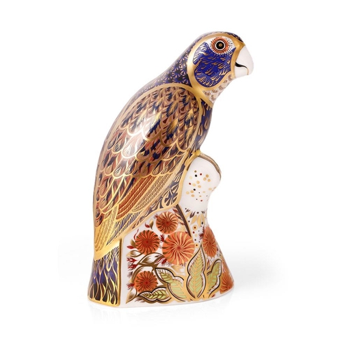 159 - Boxed Royal Crown Derby paperweight, Bronze Winged Parrot, 18cm high, gold stopper, red printed mark... 