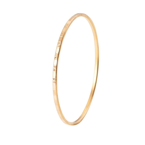 219 - Yellow metal (tests as 18ct or better) circular bangle with engraved decoration, 62mm diameter, 11.0... 