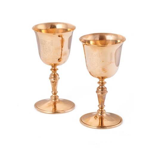 233 - A pair of hallmarked 9ct gold goblets, in presentation case, to commemorate the Octocentenary of New... 