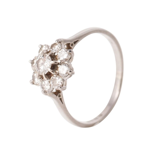 240 - 18ct white gold 'Daisy Cluster' ring, set diamonds, combined 0.7ct. Ring size 'S'. Gross weight 3.9 ... 