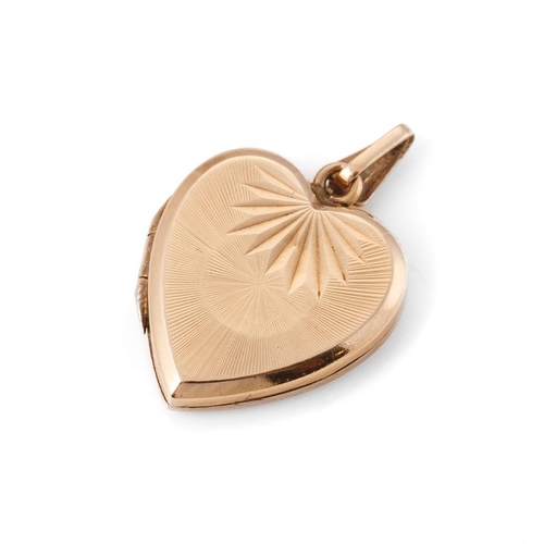 255 - 9ct yellow gold (back and front) heart shaped locket. Gross weight 2.6 grams.