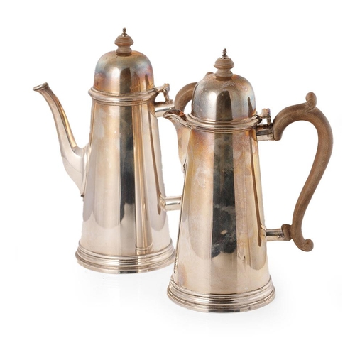 278 - Hallmarked silver coffee pot with a matching silver hot water jug, both with wooden handles and fini... 