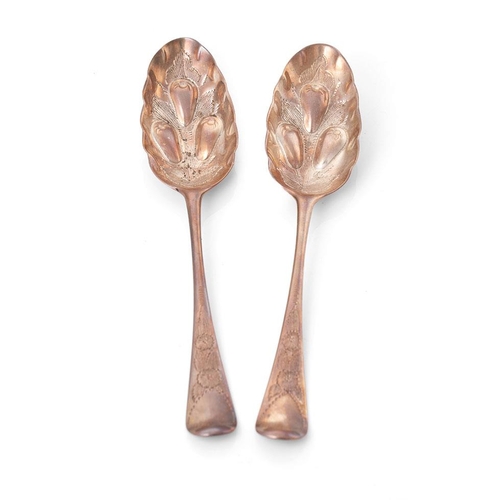 292 - A pair of Georgian silver fruit spoons, ornate handles, embossed bowls, 20cm long, hallmarks rubbed,... 