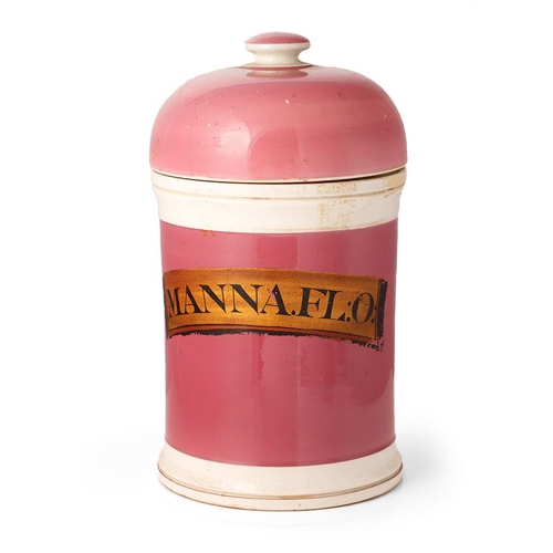 71 - Victorian ceramic apothecary jar, in pink colourway, original gold label 'Manna .FL:O', 27cm tall.