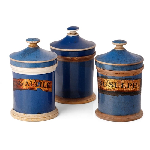 72 - A trio of Victorian ceramic apothecary jars, in blue, to include 'Ung. Sulph', 'Ung. Althae' and one... 