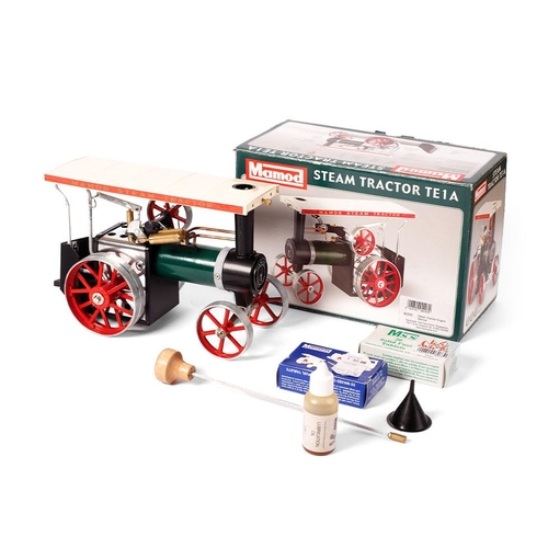 80 - Boxed Mamod TE1A Steam Tractor, with funnel, tablets and other parts.