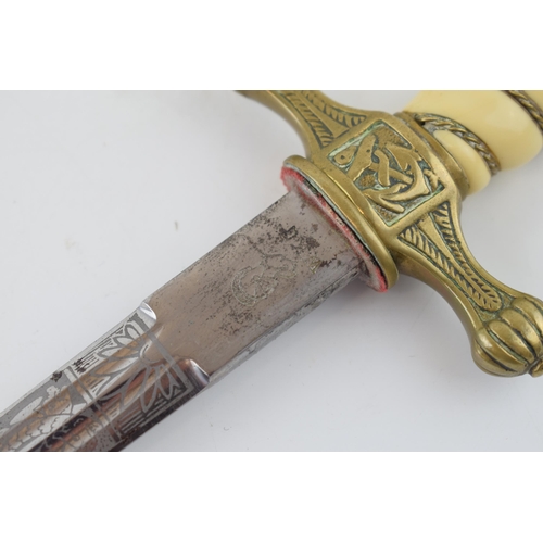 102 - WW2 Era Kriegsmarine Officers Dagger by WKC with brass fittings and etched blade bearing WKC maker m... 