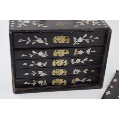 106 - A Mah-Jong set in original lacquered case with mother of pearl inlaid design. Four internal drawers ... 