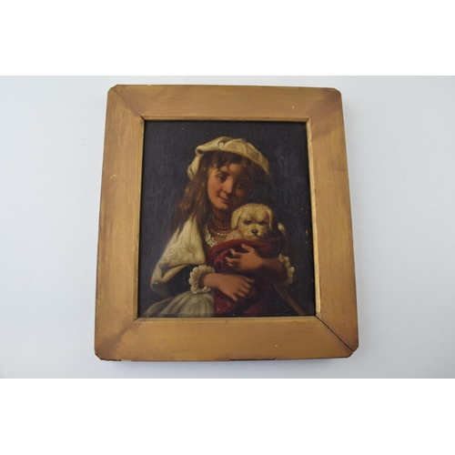 115 - Geotz 1878 signed oil on canvas in gilt frame depicting girl holding dog in blanket. 17cm x 20cm.