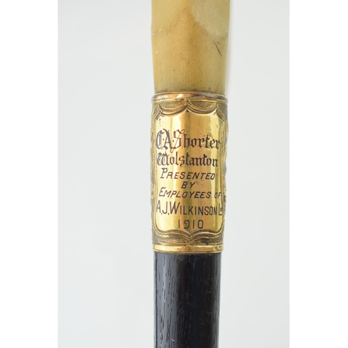 135 - Staffordshire / Pottery interest: an ebonised walking cane, presented to Colley Arthur Shorter (who ... 