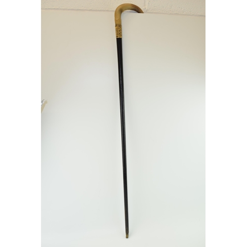 135 - Staffordshire / Pottery interest: an ebonised walking cane, presented to Colley Arthur Shorter (who ... 