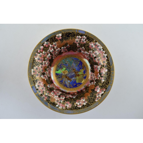 140 - Wedgwood fairyland lustre footed bowl, designed by Daisy Makeig Jones, the centre panel decorated wi... 