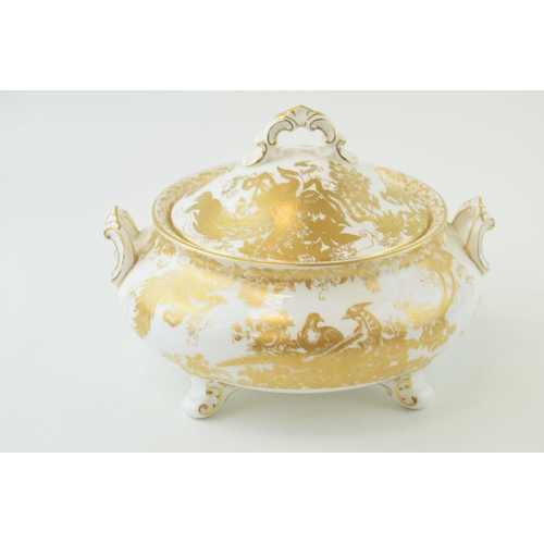 154 - Royal Crown Derby lidded tureen in the 'Gold Aves' pattern, raised on scroll feet, 22.5cm wide.