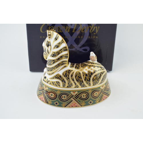 158 - Boxed Royal Crown Derby paperweight, recumbent Zebra, 13cm high, gold stopper, red RCD stamp and mar... 