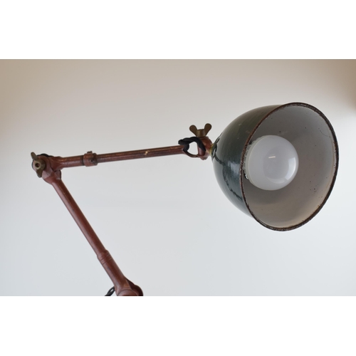 34 - An early 20th century 'Dugdills' machinist’s lamp, raised on a loaded plinth with DUGDILLS name in c... 