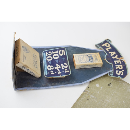 62 - A collection of early 20th century advertising point of sale signs in cardboard and tin to include t... 