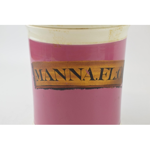 71 - Victorian ceramic apothecary jar, in pink colourway, original gold label 'Manna .FL:O', 27cm tall.