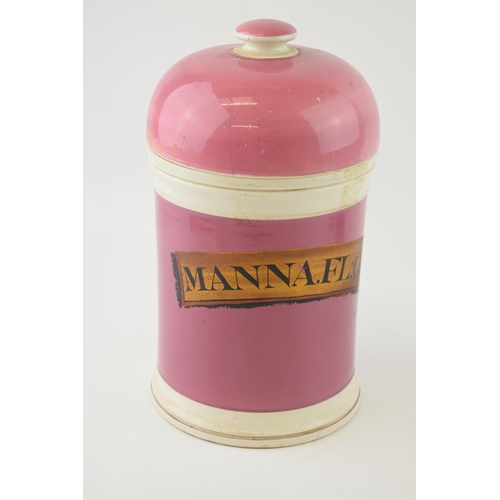 71 - Victorian ceramic apothecary jar, in pink colourway, original gold label 'Manna .FL:O', 27cm tall.