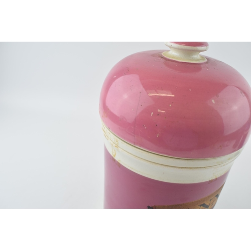 71 - Victorian ceramic apothecary jar, in pink colourway, original gold label 'Manna .FL:O', 27cm tall.