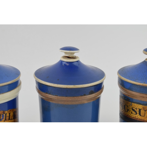 72 - A trio of Victorian ceramic apothecary jars, in blue, to include 'Ung. Sulph', 'Ung. Althae' and one... 