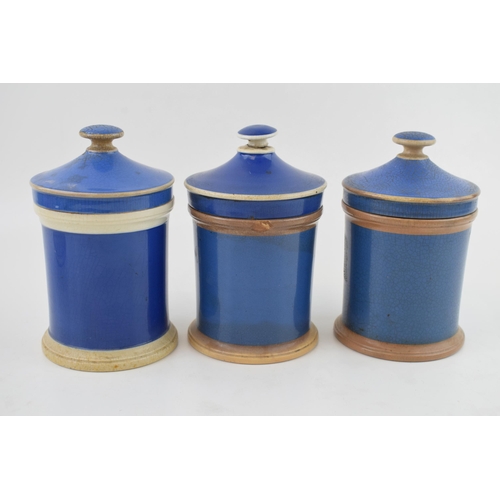 72 - A trio of Victorian ceramic apothecary jars, in blue, to include 'Ung. Sulph', 'Ung. Althae' and one... 