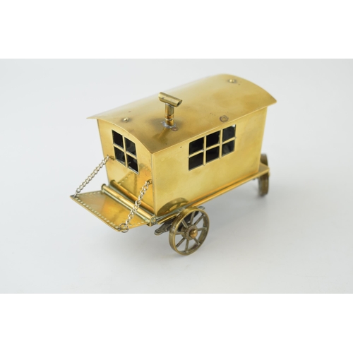 77 - A scratch-built gypsy caravan / showman's wagon in brass. c1930s. Detailed model with moving wheels,... 