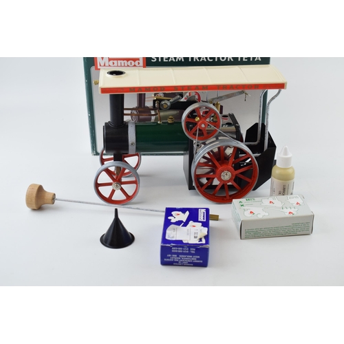 80 - Boxed Mamod TE1A Steam Tractor, with funnel, tablets and other parts.