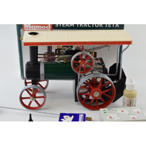 80 - Boxed Mamod TE1A Steam Tractor, with funnel, tablets and other parts.