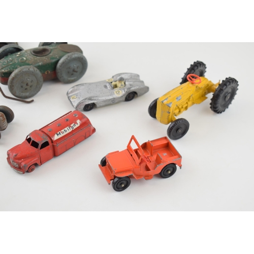 84 - A collection of tinplate and clock work toys by manufacturers such as METTOY and other pre-war examp... 