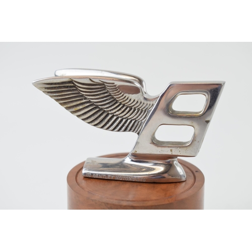 87 - Bentley mascot mounted on a burr wood base professionally tuned by a Rolls Royce craftsman. Height 1... 