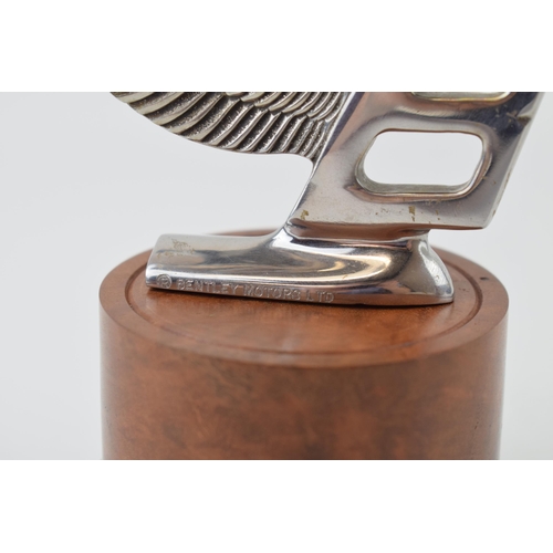 87 - Bentley mascot mounted on a burr wood base professionally tuned by a Rolls Royce craftsman. Height 1... 