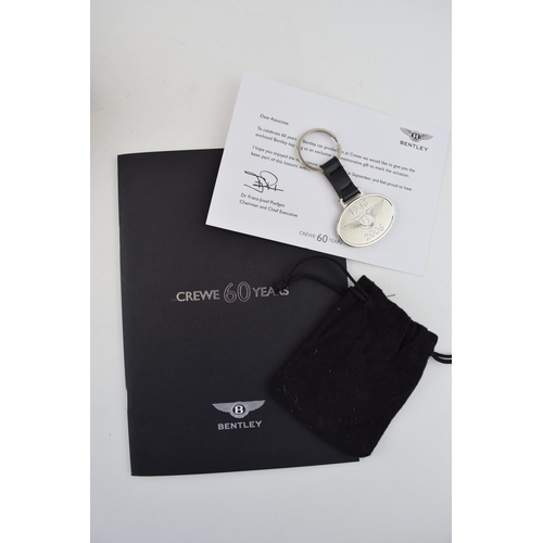 88 - 60 years of Bentley 'Crewe 60 Years' keyring with original booklet. Only available to Bentley / Roll... 