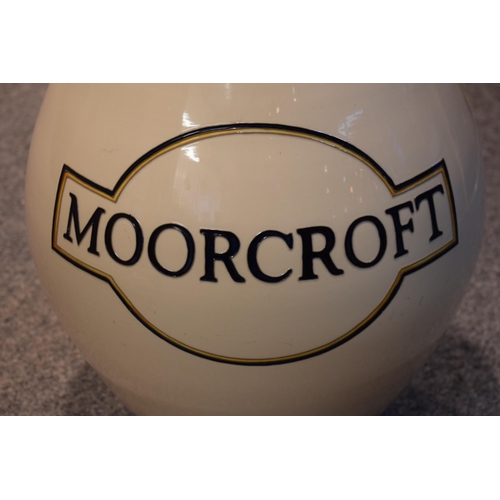 162 - An extra large Moorcroft ovoid vase decorated with the Moorcroft logo, an advertising vase / point o... 