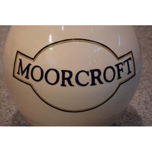 162 - An extra large Moorcroft ovoid vase decorated with the Moorcroft logo, an advertising vase / point o... 