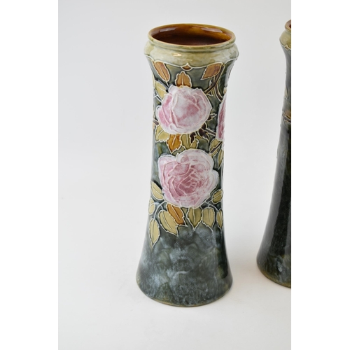 177 - Royal Doulton stonewarea Art Nouveau pair of vases with pink and floral decoration, 'LP' for Lily Pa... 