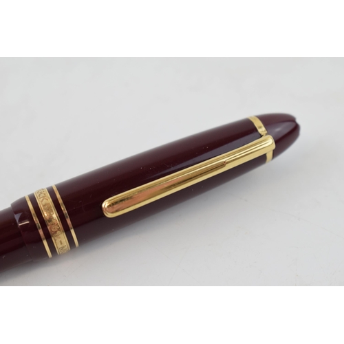 198 - Montblanc Meisterstuck Number 161 Ballpoint Pen, with twist-action bordaux burgundy resin barrel and... 