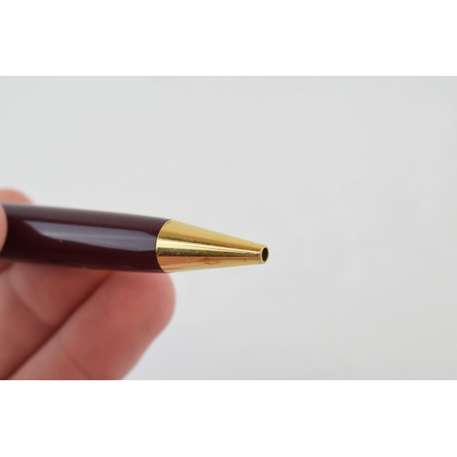 198 - Montblanc Meisterstuck Number 161 Ballpoint Pen, with twist-action bordaux burgundy resin barrel and... 