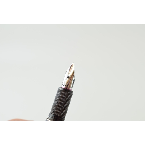 201 - A Montblanc Starwalker Fountain Pen, 14ct white gold nib, black resin body with silver coloured clip... 